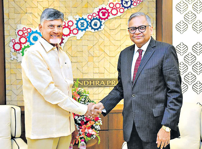 Tata Group Chairman Chandrasekaran shakes hands with CM Chandrababu