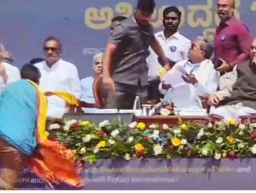 Man tries to approach Karnataka CM on stage,security staff whisks him away